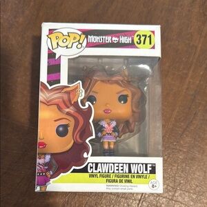 Monster High Clawdeen Wolf Vinyl Figure with Brown Hair and Purple Outfit
